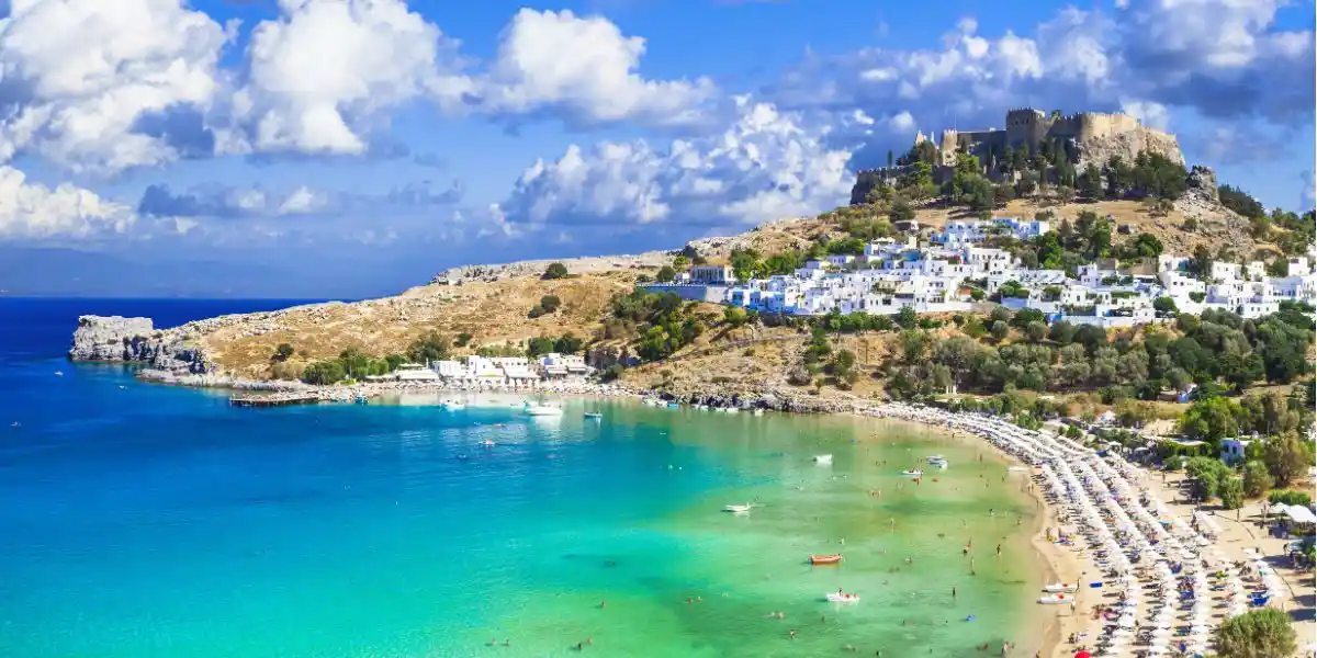 Panoramic view of Lindos bay, Rhodes, Greece. Panoramic view of Lindos bay, village and Acropolis, Rhodes, Greece