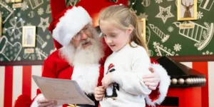 a little girl meeting santa