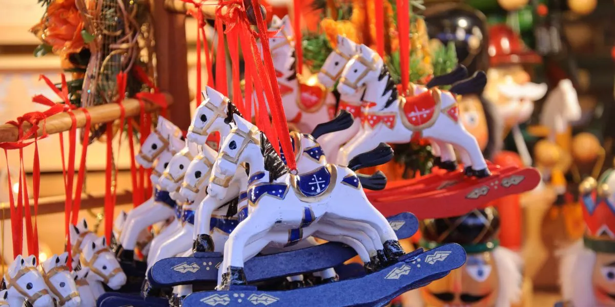 christmas decorations on a stall for sale - new christmas markets in europe
