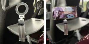 Phone holder clipped on an airplane seat-tray must have travel accessories