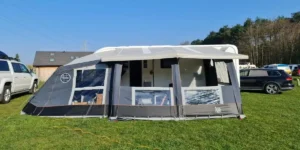 NEC caravan show an awning and caravan on a sunny lawn
