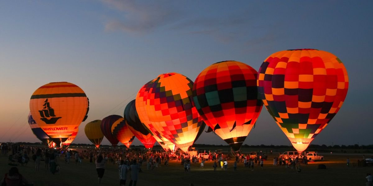Evening hot air balloon glow at the Dallas Fort Worth (DFW) Summer Balloon Classic held in Waxahachie, Texas