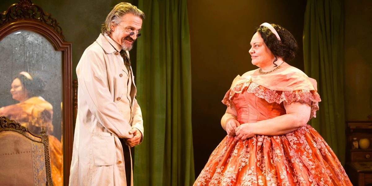 two actors looking at each other on stage, set in US 1800's