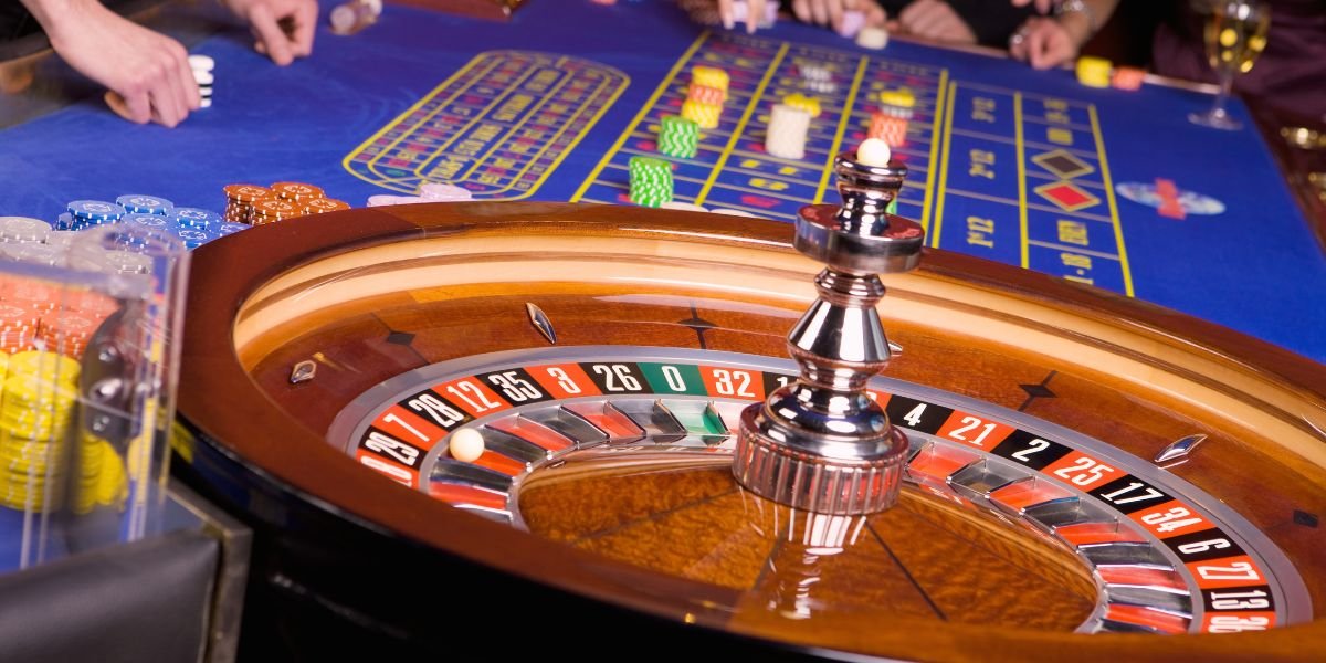 close up of an elegant old school roulette table with blue baize