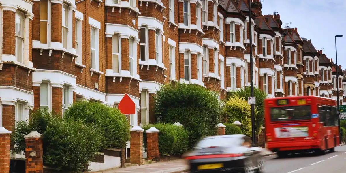 Street in London. Terraced Houses and blured traffic at Clapham London