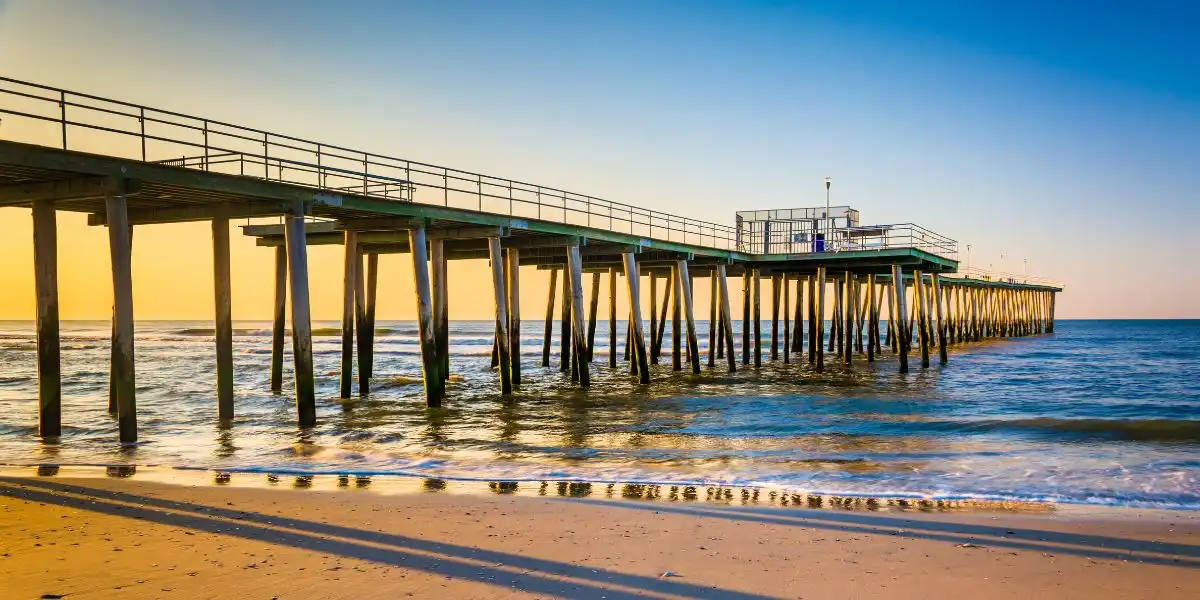 Fishing pier and the Atlantic Ocean at sunrise in Ventnor City, New Jersey