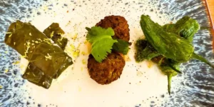 plate of food with 3 small portions