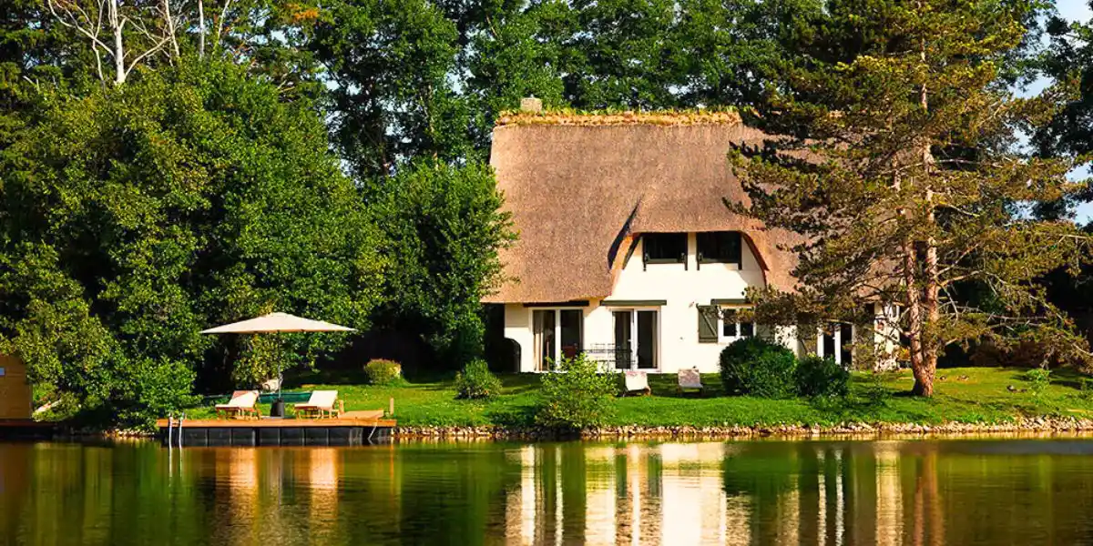 Cottage by the side of a lake Curated Spaces expands into europe