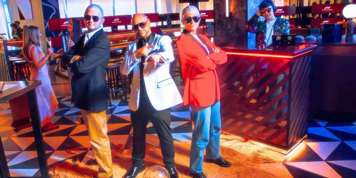 three people in fancy dress as pitbull