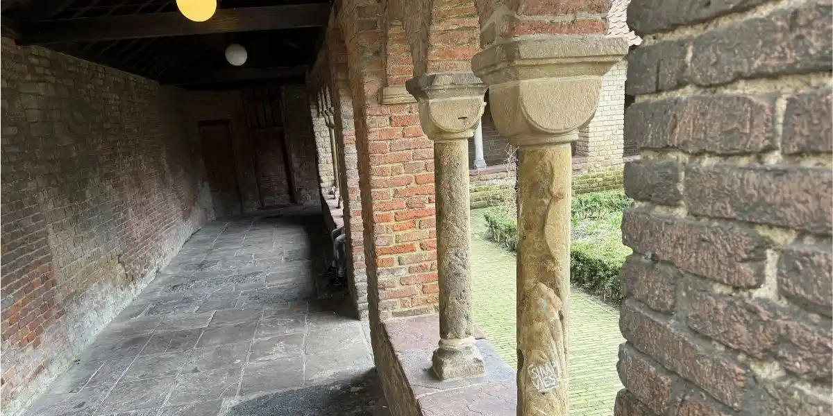some ancient columns in a courtyard