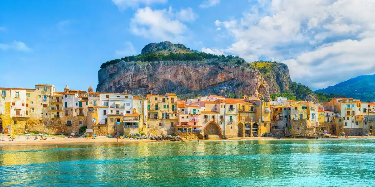 Cefalu, medieval village of Sicily island, Province of Palermo, Italy. a beach front with colourful houses