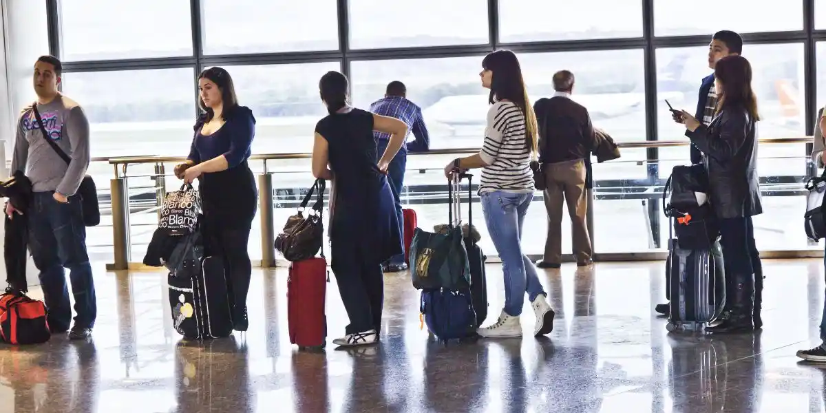 people standing in a queue