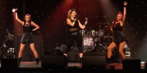 women on stage at motorhome