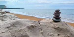 rocky coastline with rocks stacked up