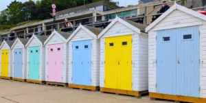 beach huts with colourful doors