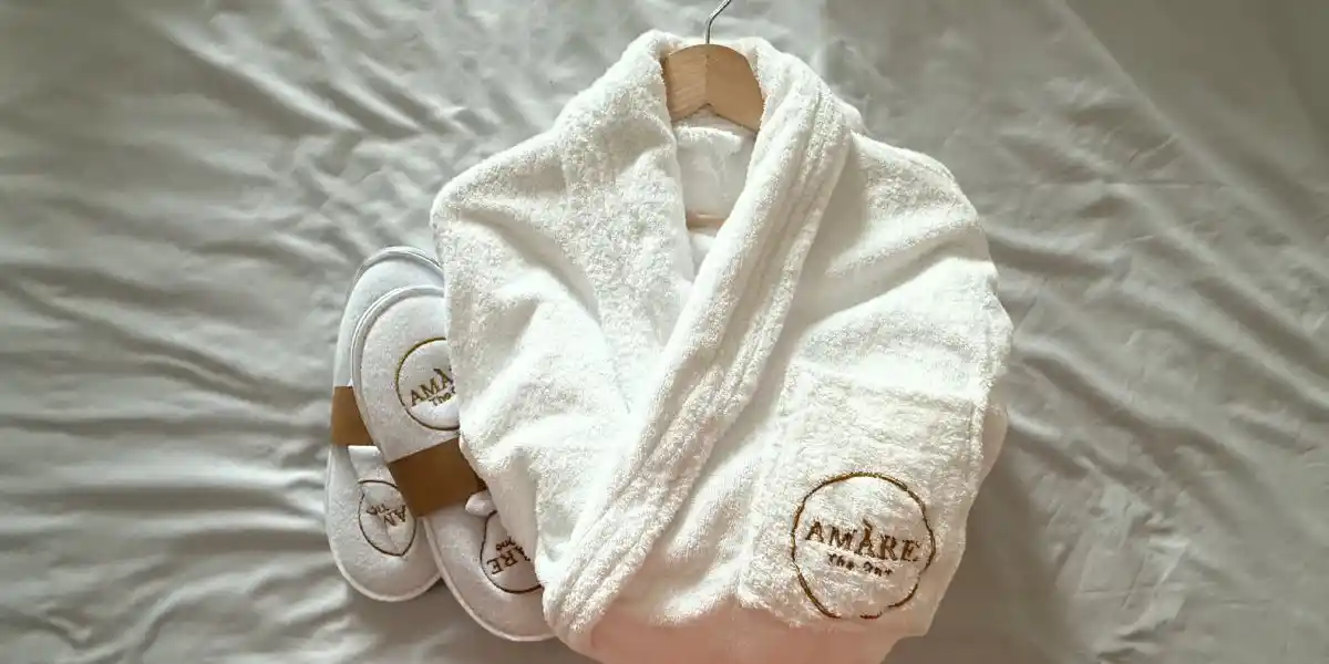 robe and slippers at amare beach hotel