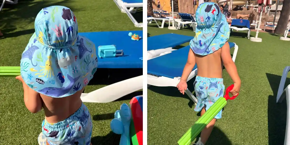 little boy wearing uv proof swimwear