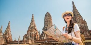 woman in thailand reading a map