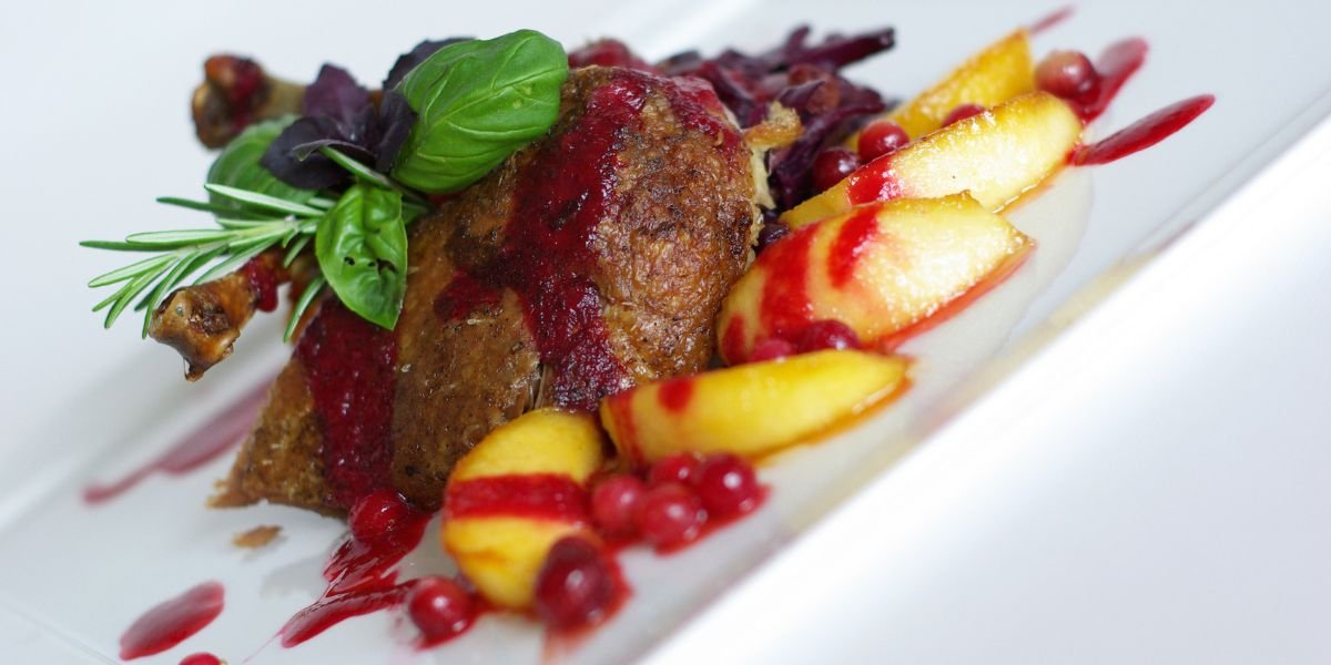 a white plate with food presented nicely