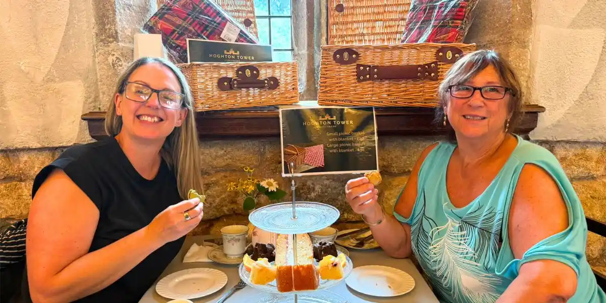mum and daughter enjoying afternoon tea at hoghton tower