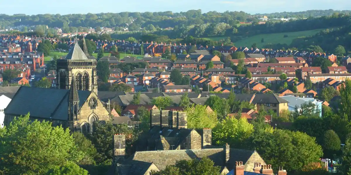 Leeds Cityscape with lots of chimneys viewed from top of a building