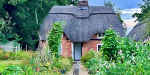 thatched cottage in furzey gardens, new forest