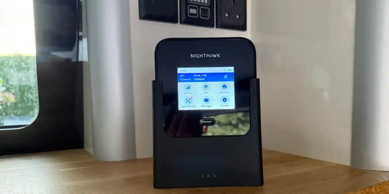 the neatgear router on a worktop in a campervan