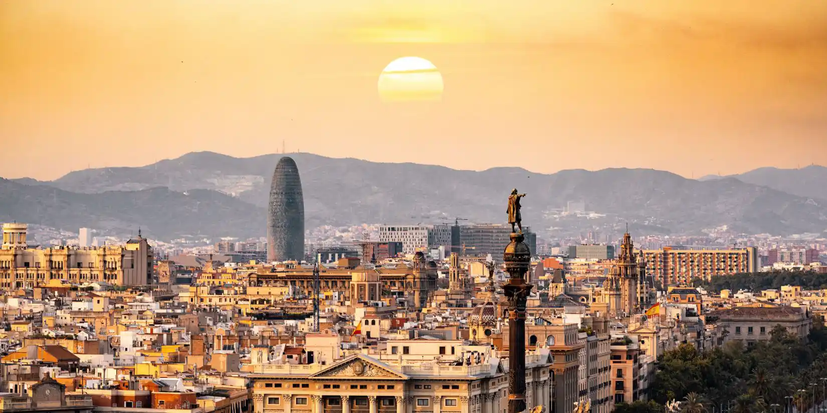 rooftop view of Barcelona at sunset