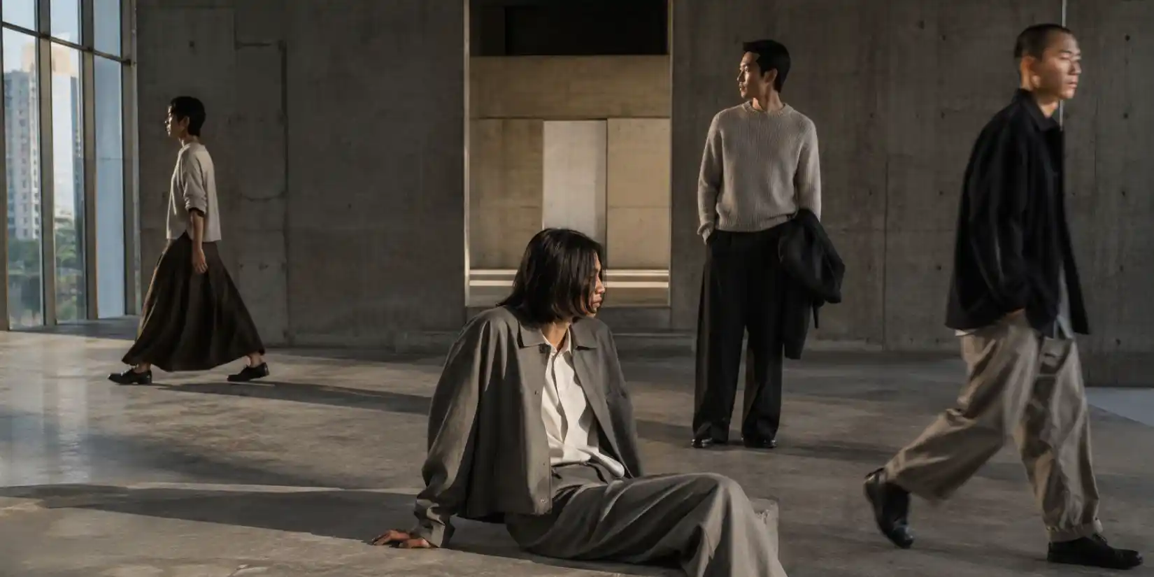 Spring-Summer 2027 fashion models in brutalist setting