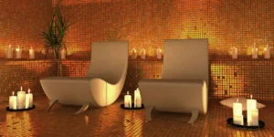 inside of a spa with candles and relaxing chairs & gold wall tiles, spas in York