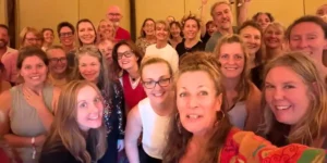 A group of people in a selfie at the big retreat in cambridgeshire