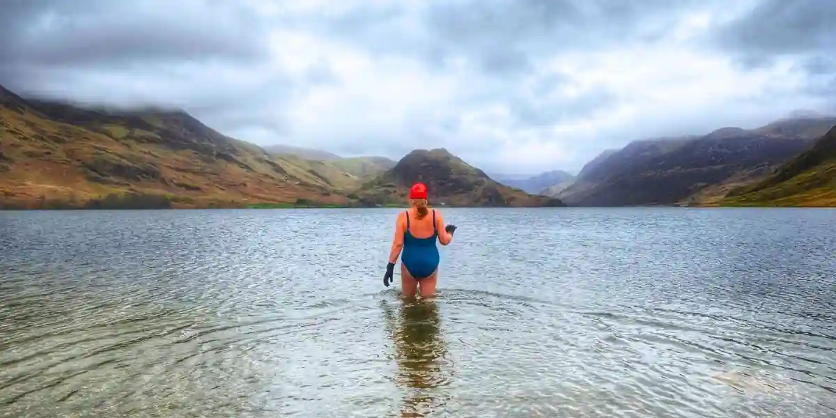 Sara Barnes wild swimming in the Lake District in autumn