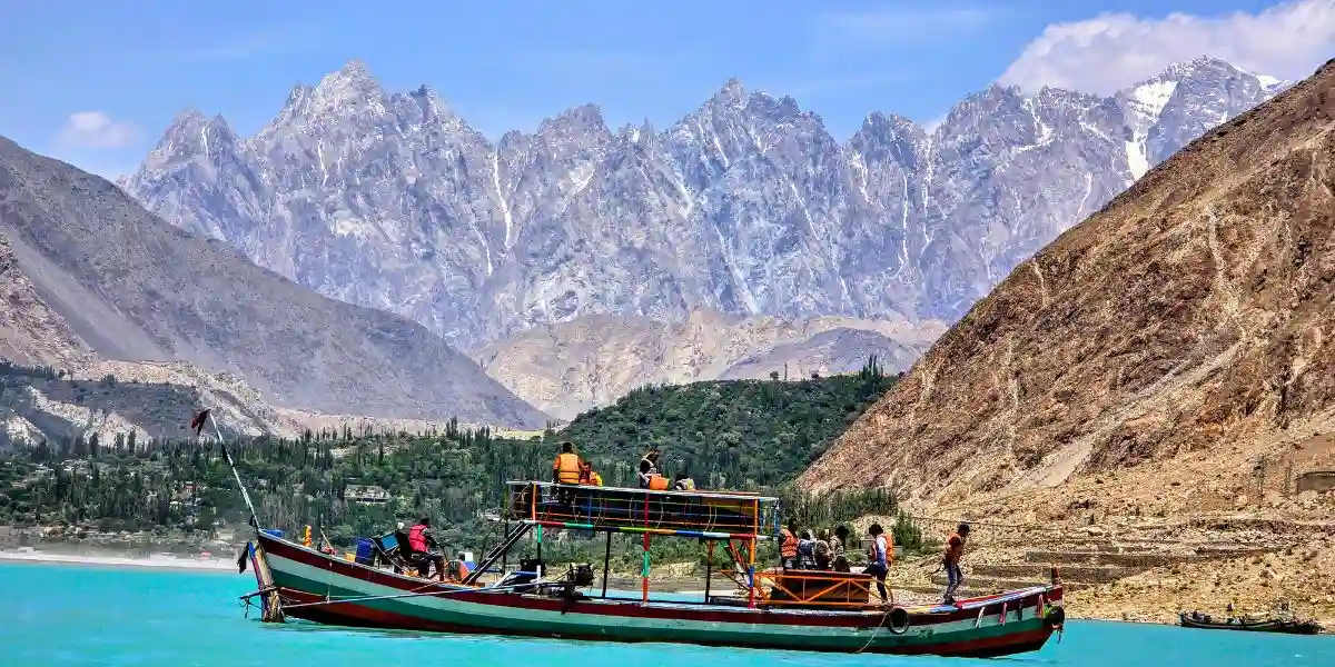 breathtaking landscapes of Hunza Nagar with a scenic boat ride under majestic mountain peaks