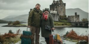a couple of vloggers standing in front of a castle with sound engineer isseus