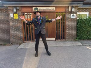 a man standing outside the RSVP experience in sussex