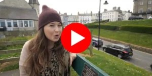 a woman ready to explore whitby looking for the paranormal